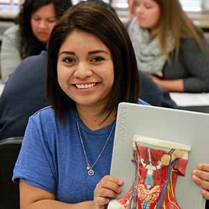 Female student sitting in class