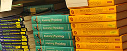 Biology books on a campus bookstore shelf