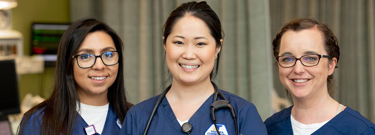 three Tacoma Community College students studying healthcare