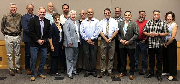 Members of the Southwest Washington High Technology Council (HTC) with Mohammed Maraee, associate director of the Center of Excellence for Aerospace & Advanced Manufacturing. Standing with Maraee are Clark College Foundation Chief Executive Officer Lisa Gilbert, Clark College Interim President Sandra Fowler-Hill and HTC Chairman Ben Bagherpour. The council sought and received legislative funding to open the Center of Excellence for Semiconductors & Electronic Manufacturing in Vancouver, Washington. 